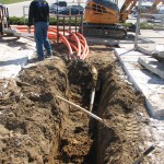Pulling seven htpe conduits underground at once